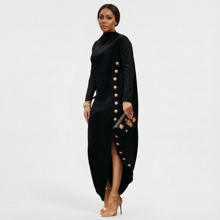 Women's black maxi evening dress with high-neck, long sleeves, and elegant gold button side slit. Perfect for formal events.