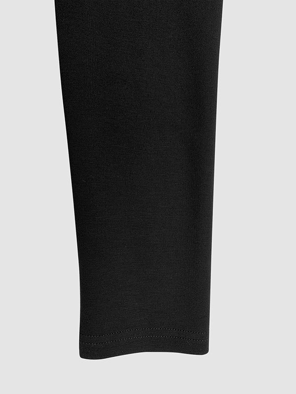 Women's elegant black maxi evening gown, high-neck, long sleeves, and a flattering gold button detailed side slit.