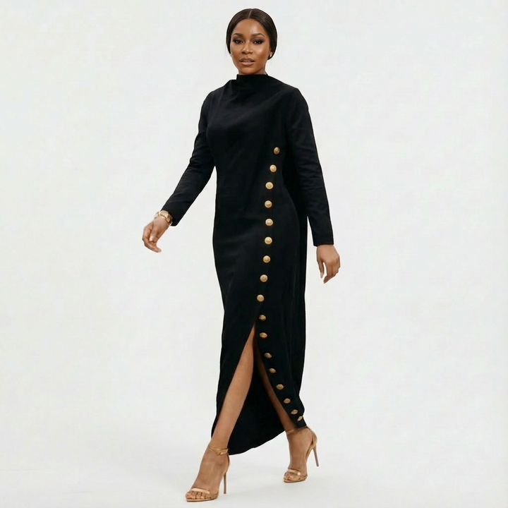 Chic orange maxi dress for women, featuring a stylish high-neck, long sleeves, and a modern gold button side slit detail.