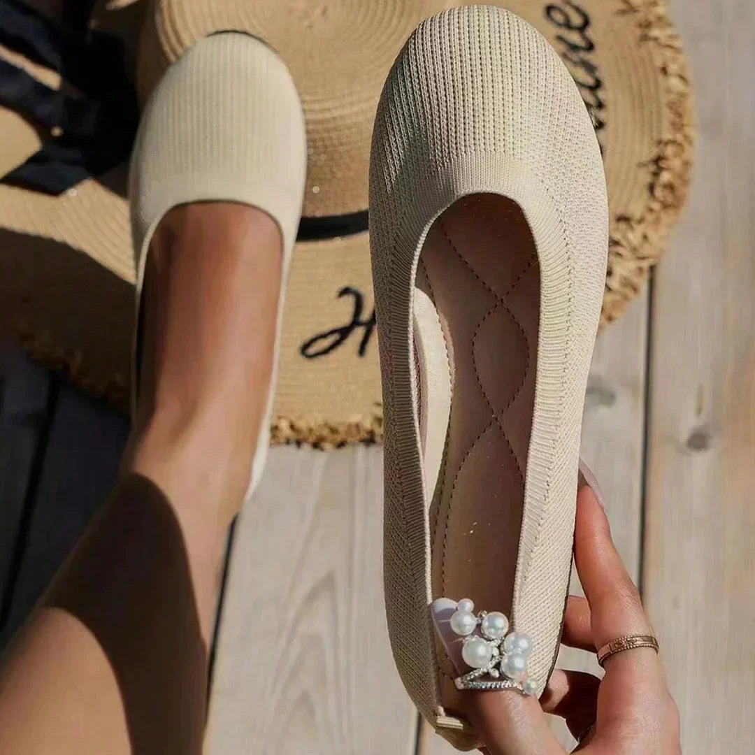 Elegant nude women's slip-on ballet flats, comfortable, flexible & perfect for any occasion.