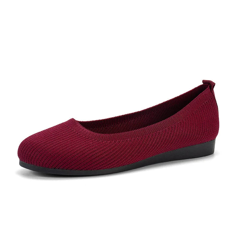 Navy blue women's flexible ballerina flats, comfortable slip-on shoes for casual & office style.