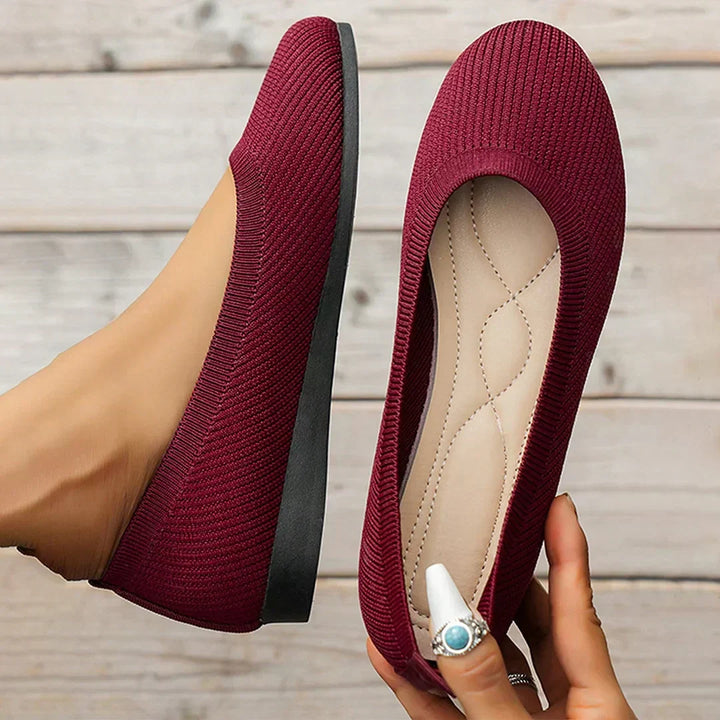 Lightweight women's ballet flats, easy slip-on design for flexible movement & all-day comfort.