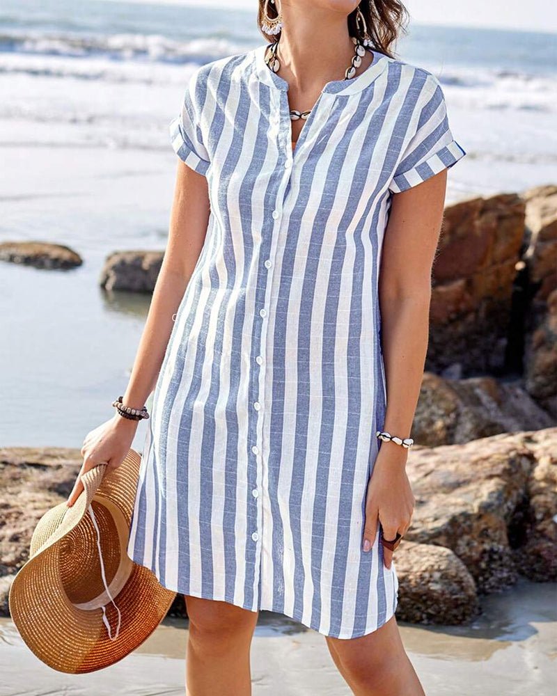 Women's blue striped shirt dress, comfortable for everyday wear. Relaxed fit, v-neck summer casual style.