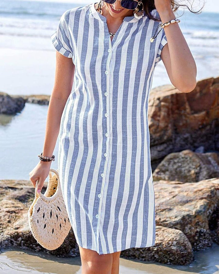 Women's casual blue striped shirt dress. Relaxed fit, v-neck, comfortable for all-day summer & everyday wear.