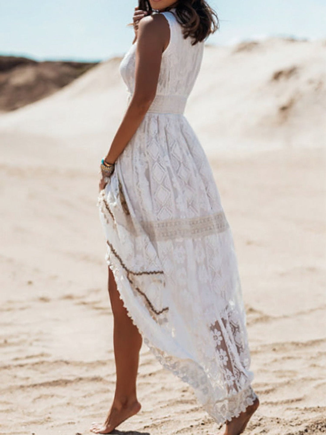 Comfortable women's sleeveless V-neck boho maxi dress with intricate lace fabric, a stylish choice for summer elegance.