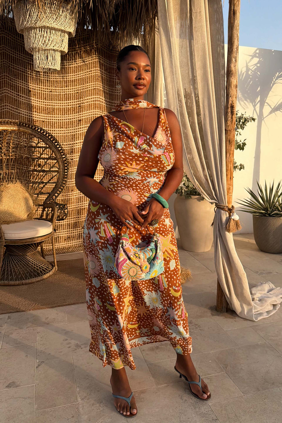 Women's halter house dress in brown fawn print, shown without detachable scarf for versatility.
