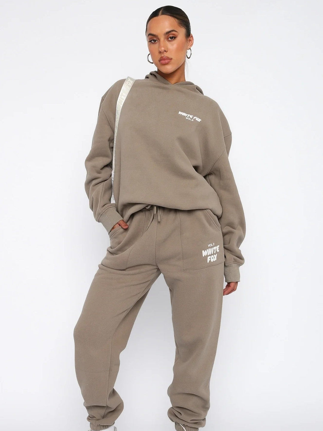 Cropped hoodie and joggers, a women's tracksuit with unique back print. Perfect comfortable and stylish loungewear set.
