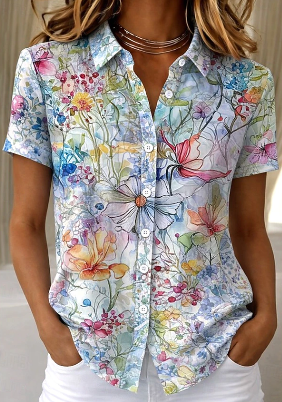 Relaxed fit women's floral button-up shirt. Stylish short sleeve blouse for casual summer and spring outfits.