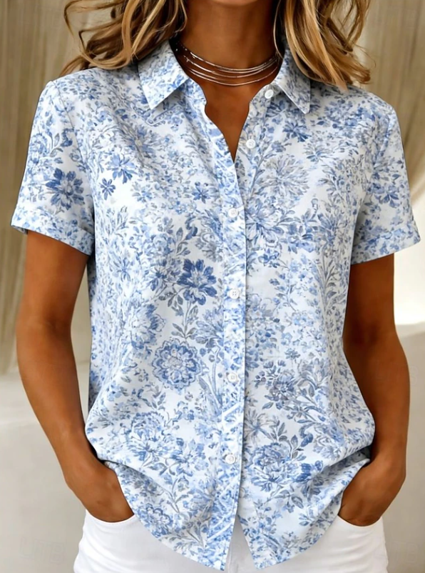 Stylish women's floral short sleeve blouse. Casual button-up shirt for comfortable summer fashion and everyday wear.