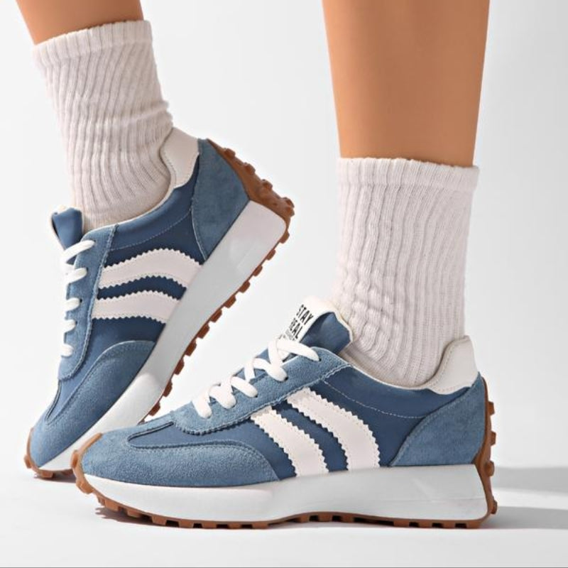 Fashionable women's retro trainers featuring a chic design for versatile casual outfits.