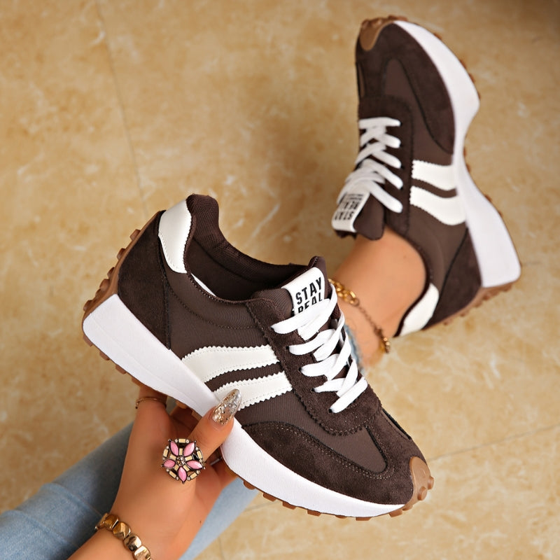 Stylish women's casual retro trainers, providing comfort and a chic look for everyday wear.