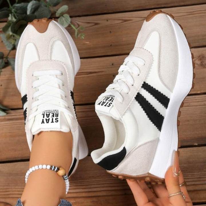 Classic retro trainers for women, combining vintage style with modern chic for casual comfort.