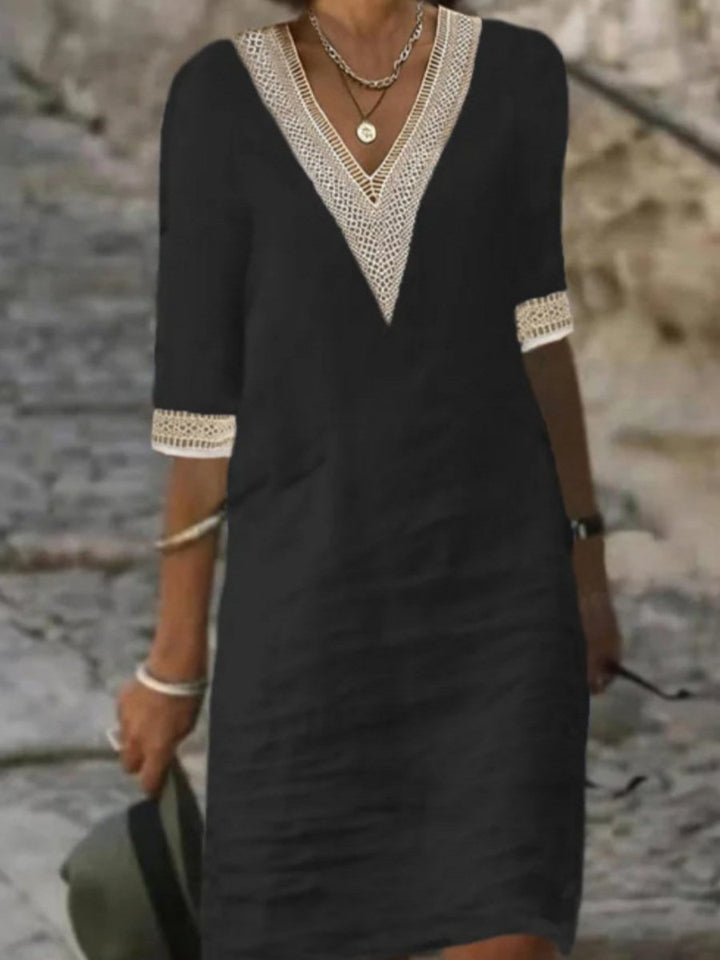 Relaxed fit V-neck dress for women, featuring intricate lace trim & comfortable three-quarter sleeves for daily style.