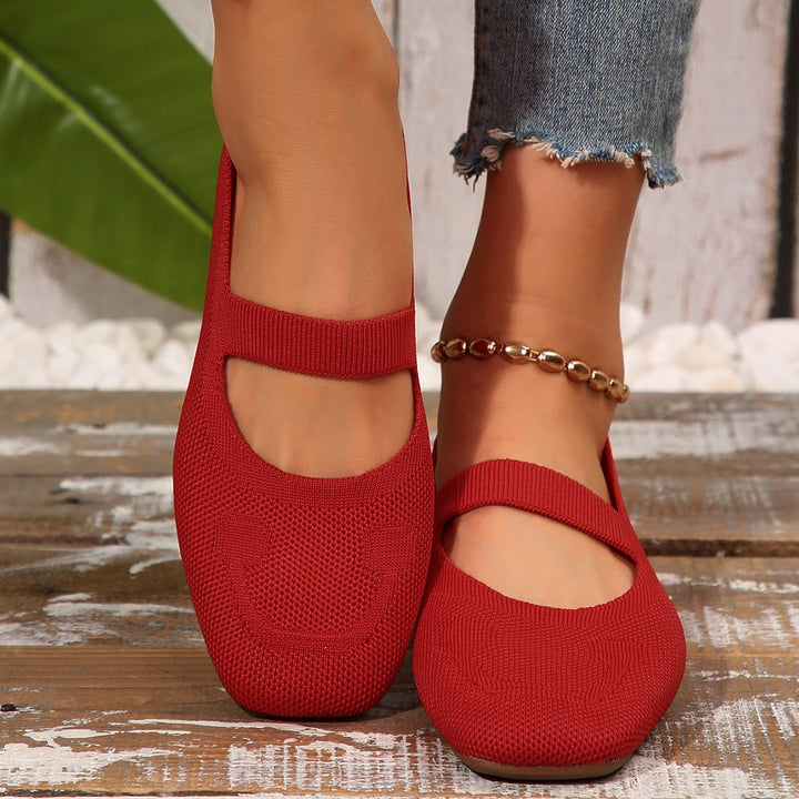 Cute women's black Mary Jane ballet flats with a cheerful design & comfy sole, ideal for casual walking.