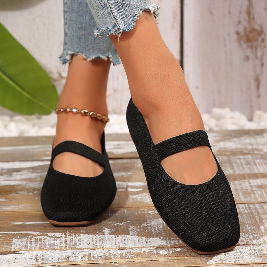 Stylish women's Mary Jane flats in navy with an adjustable strap, offering comfort and cheerful style for daily wear.