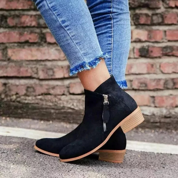 Comfortable women's ankle boots with zipper. Versatile everyday footwear, ideal for fall, winter, or spring styles.