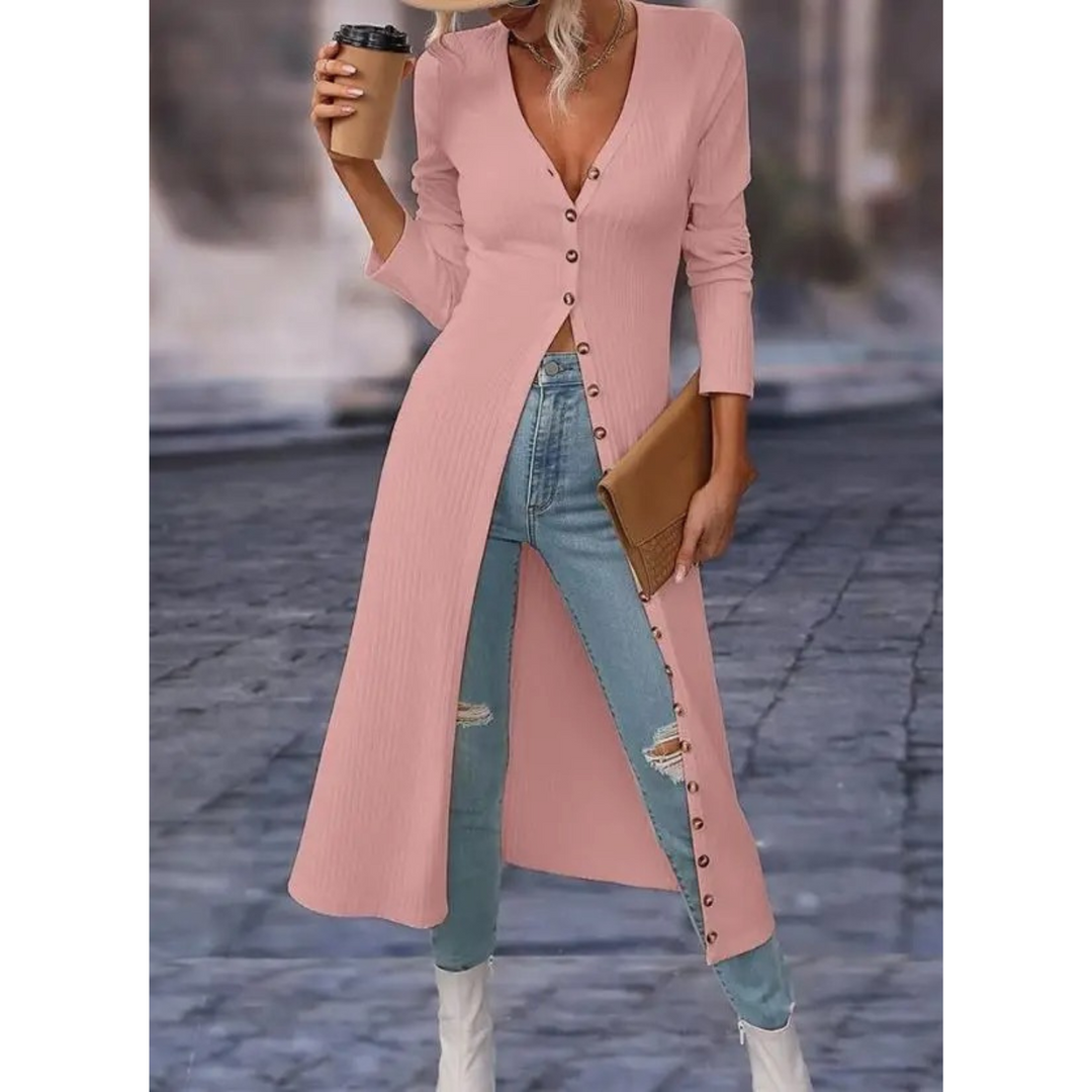Women's comfortable & stylish longline V-neck button jacket shown worn, perfect elegant outerwear for various occasions.