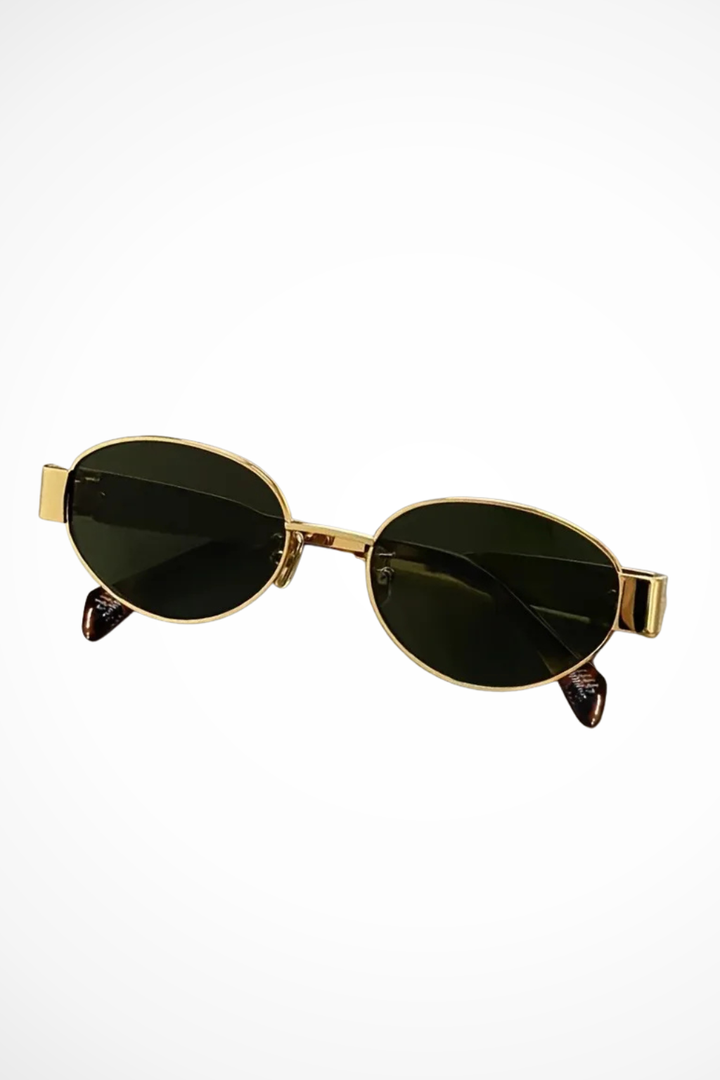 Elegant women's oval metal sunglasses, dark lenses. Chic eyewear accessory for sophisticated summer look.
