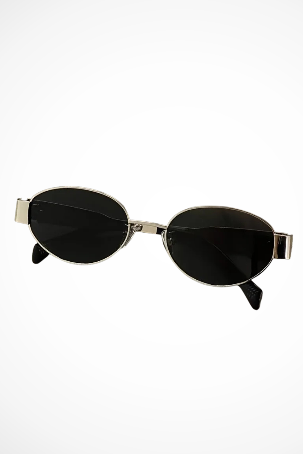 Dark tinted oval metal frame sunglasses for women, offering chic eye protection and a sleek, modern aesthetic.
