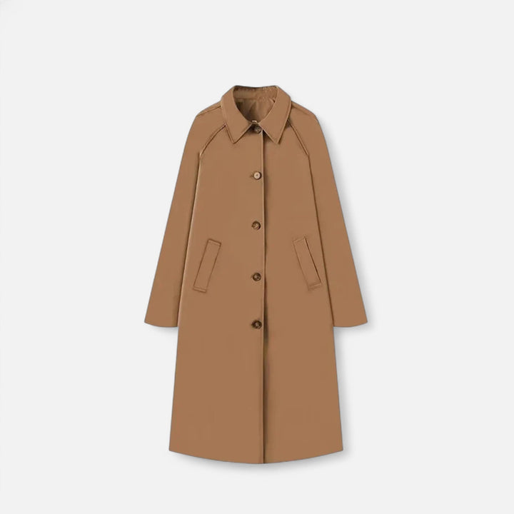 Women's classic heritage long trench coat. Elegant retro outerwear for autumn & winter fashion.
