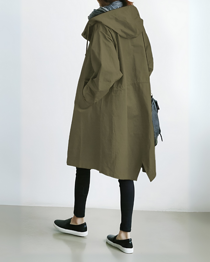 Elegant women's hooded trench coat. Loose fit, long sleeve, perfect for fall fashion & versatile outerwear.