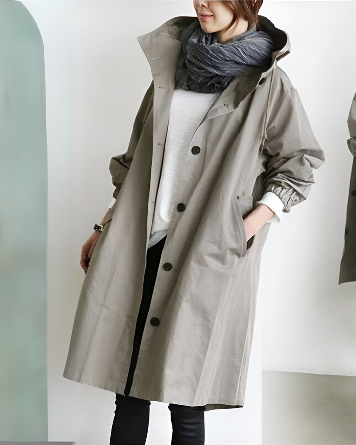 Women's versatile hooded trench coat. Classic single-breasted design, perfect for elegant autumn & winter fashion.