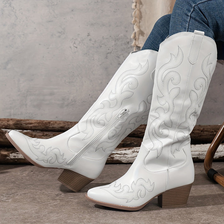 Elegant women's western boots with a pointed toe, stable block heel, perfect for fashion.
