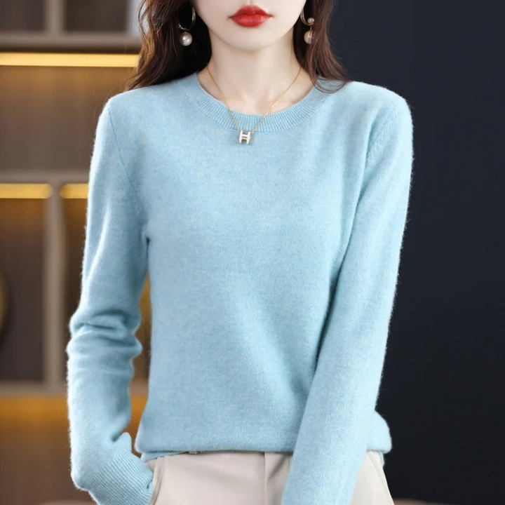 Versatile women's classic round neck sweater; soft, stylish & comfortable for everyday outfits.