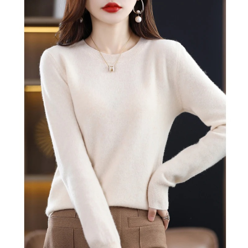 Luxuriously soft women's round neck sweater, comfortable long sleeve knit for everyday style.