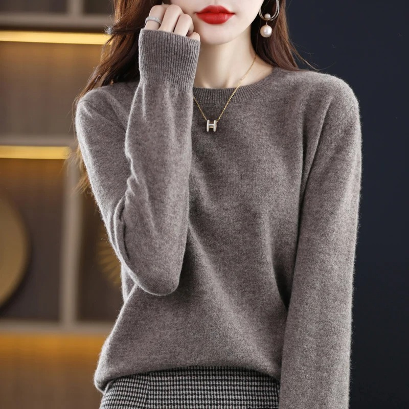 Soft, stylish women's classic round neck sweater; a versatile long sleeve top for everyday fashion.