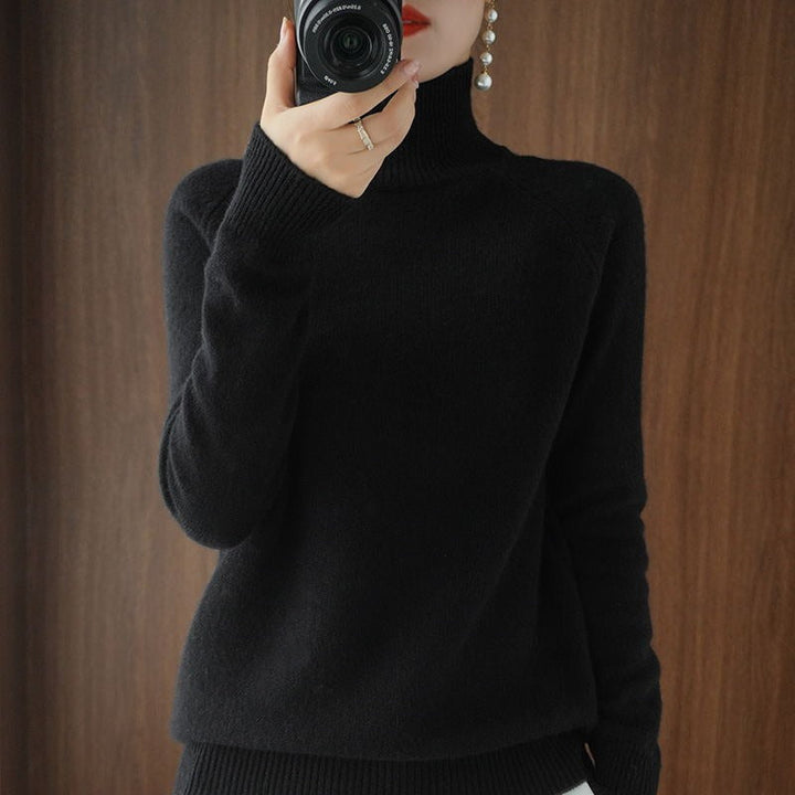 Comfortable women's long sleeve turtleneck sweater, perfect for chic minimalist fashion.