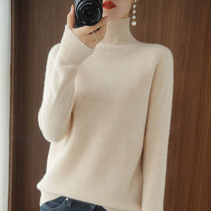 Versatile women's classic turtleneck sweater, a comfortable long sleeve top for any occasion.