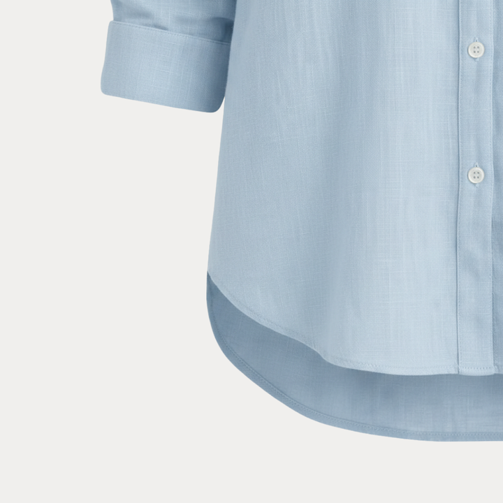 Timeless women's button-up blouse, an elegant choice for work or casual spring style.