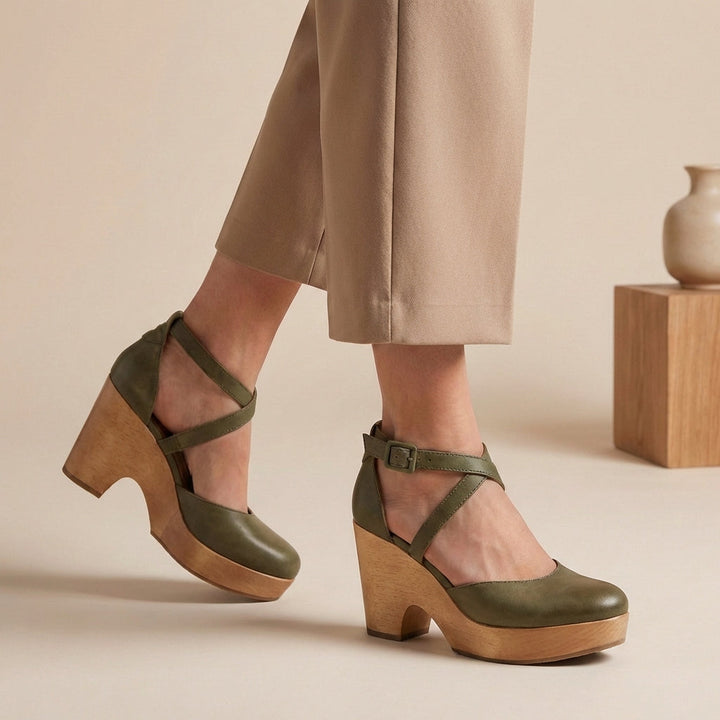 Stylish women's platform wedge sandals, closed toe with secure ankle strap, offering comfortable, chic footwear.