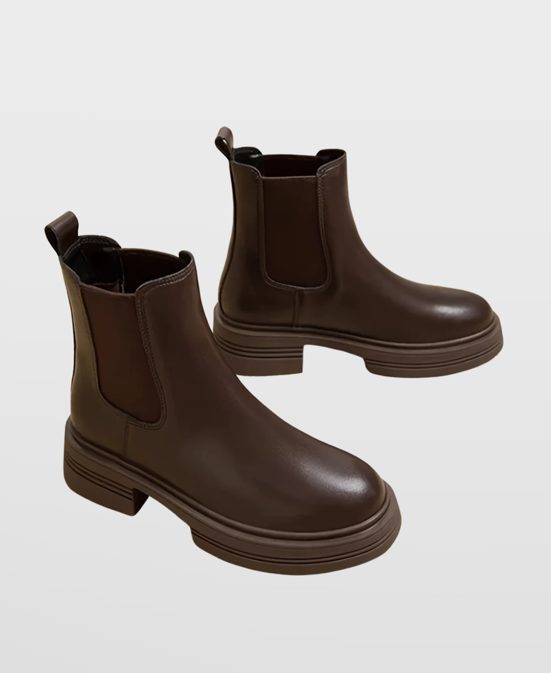Elegant women's coffee Chelsea boots with a fashionable block heel, providing comfort and style for women.