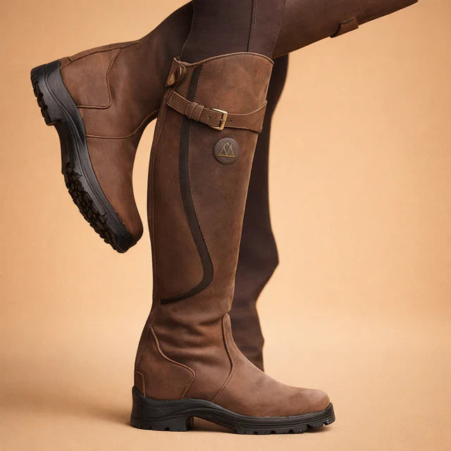 Women's comfortable high boots for all-weather wear, featuring ankle support and durable traction. Ideal for outdoor.