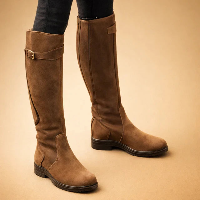 Stylish dark brown high women's boots for fall & winter, offering all-day comfort & all-weather traction.