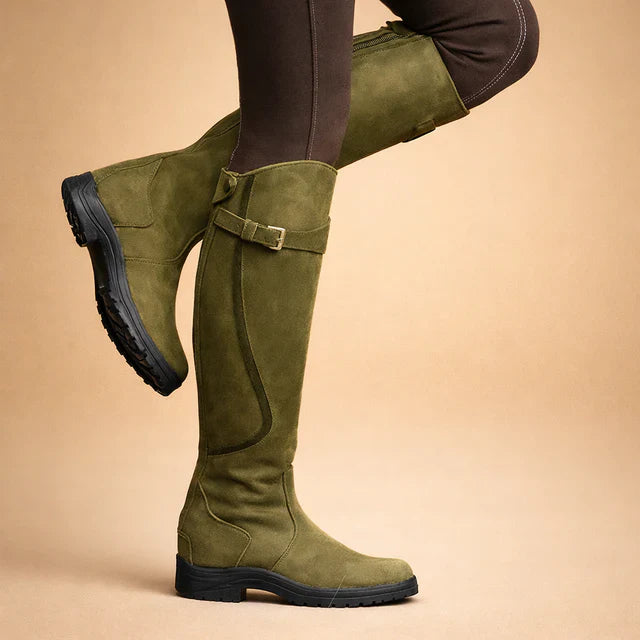 Purple stylish women's high boots, comfortable for all-day wear. Features all-weather protection & good traction.