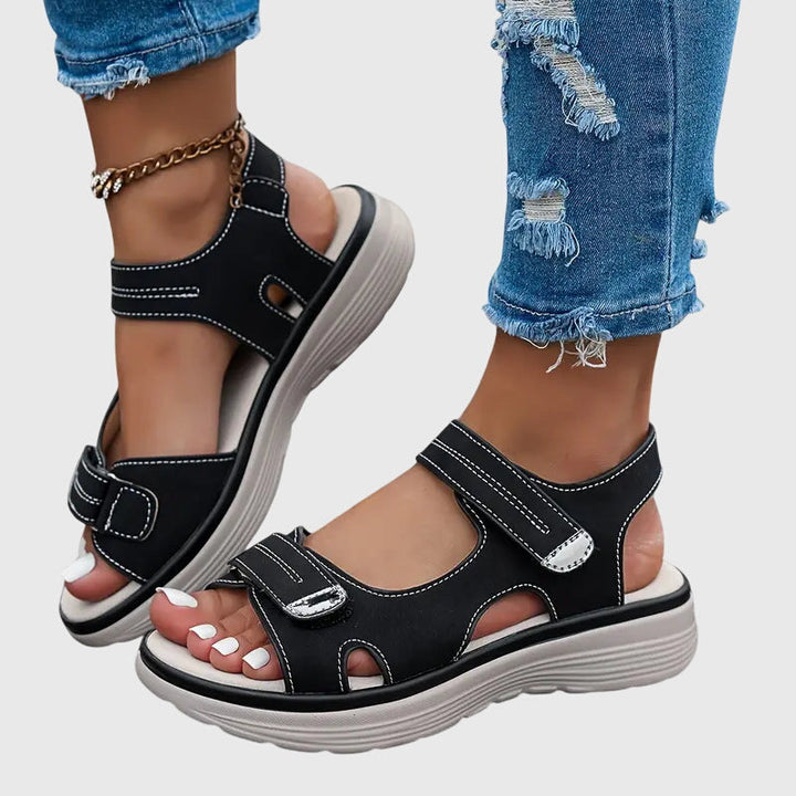 Women's comfortable orthopaedic sandals with arch support, providing effective foot pain relief.