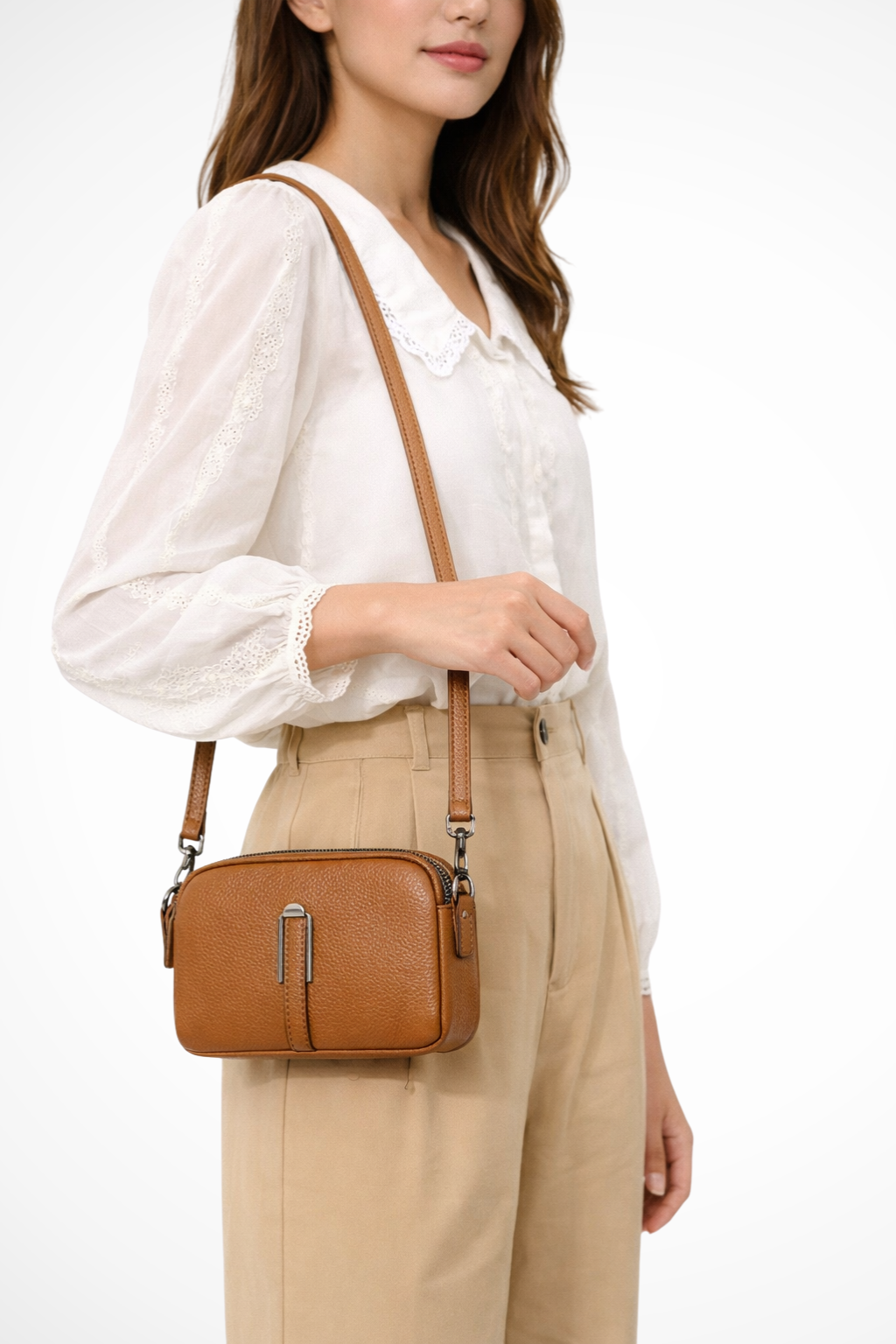 Women's compact double zip crossbody bag with textured finish, perfect everyday shoulder purse.