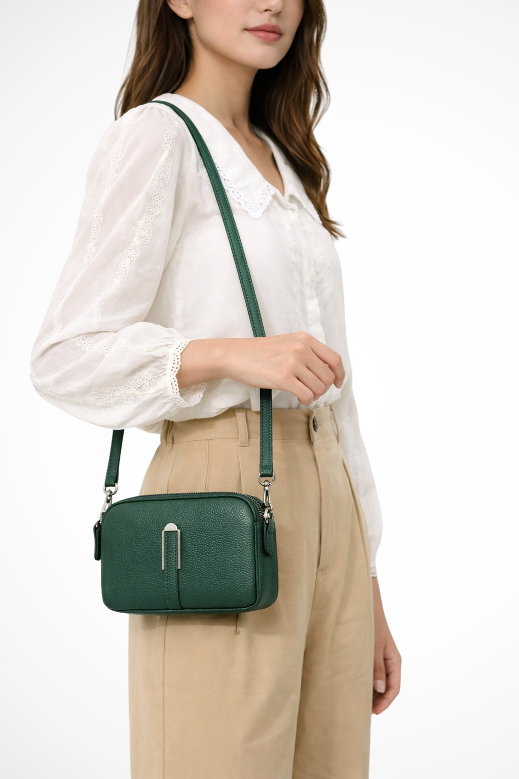 Elegant women's textured compact shoulder bag with double zippers, a versatile everyday handbag.