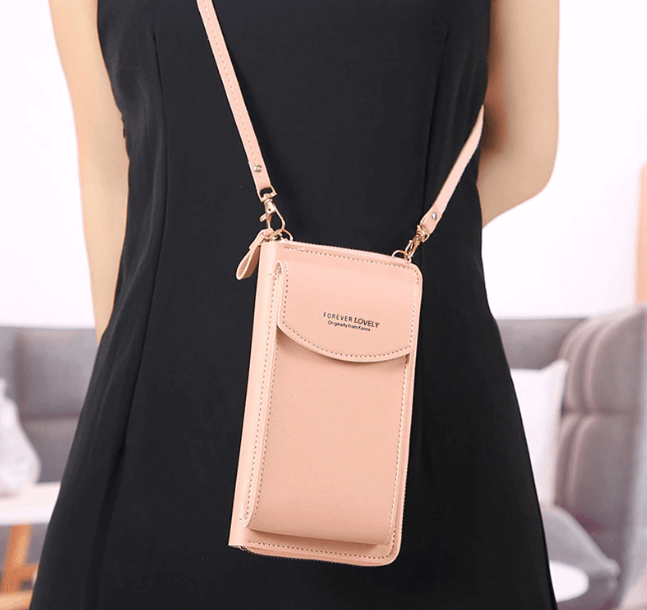 Back view of women's sleek compact PU leather crossbody bag, minimalist design.