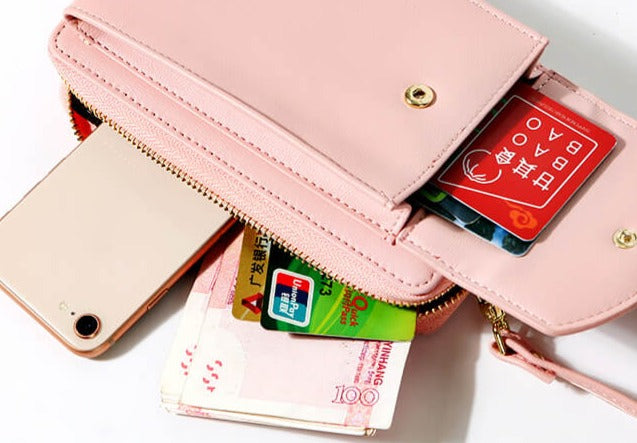 Women's compact PU leather everyday bag, small yet spacious with adjustable strap.