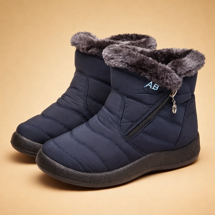 Easy slip-on women's winter boots, cozy lined ankle design ensures warmth & comfort for daily wear.
