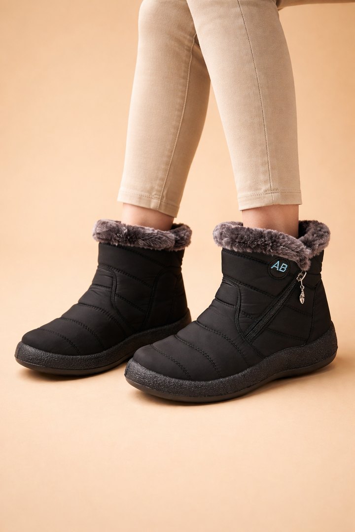 Lined, warm, and stylish women's winter ankle boots, ideal for cozy comfort in cold weather.