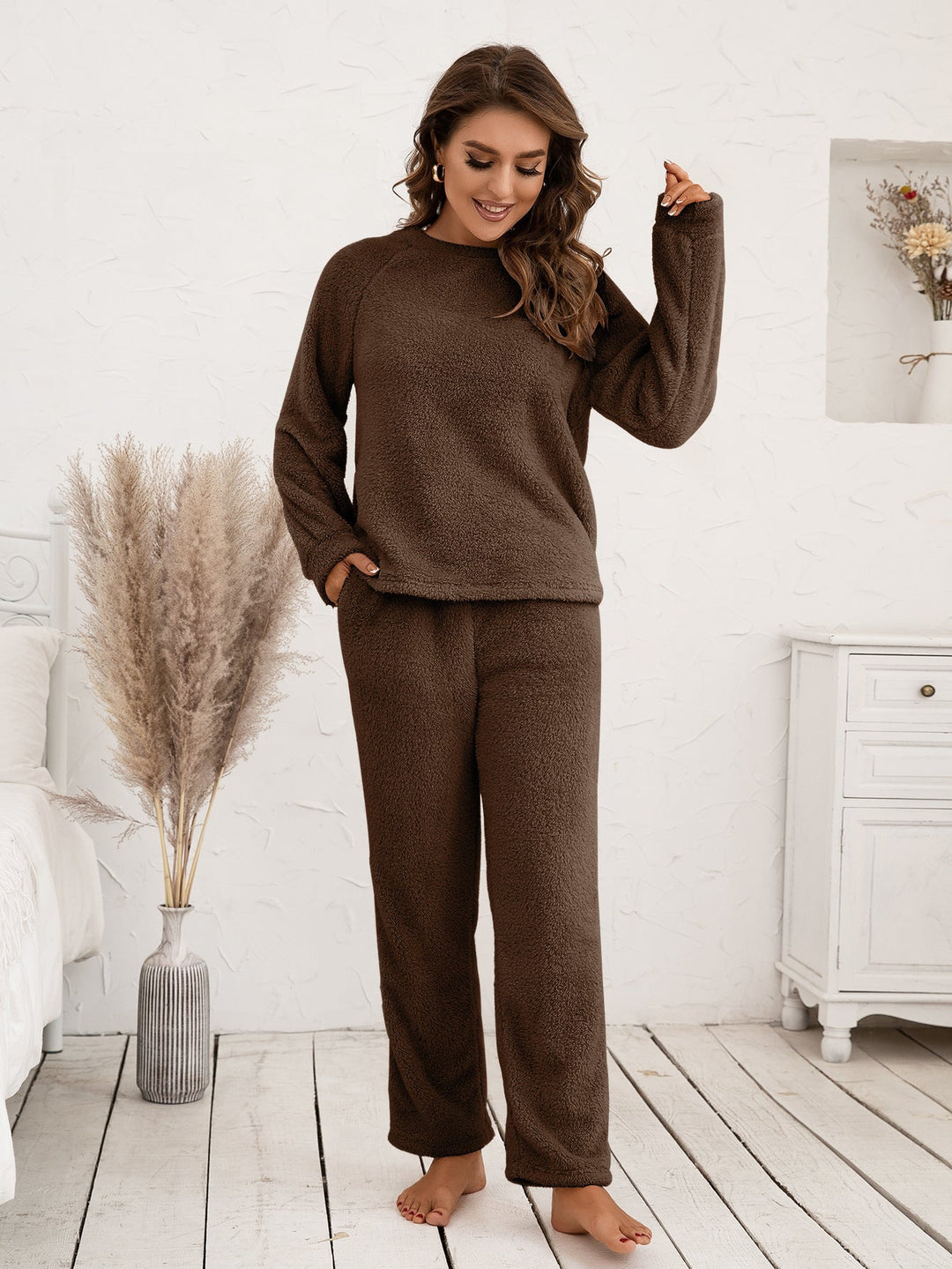 Breathable women's loungewear, long sleeve top and relaxed pants for all-night comfort.