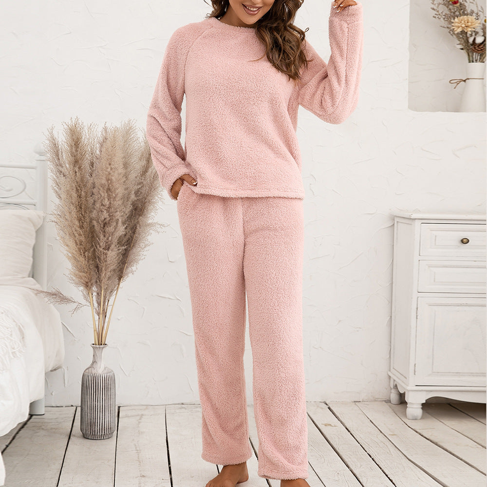 Modern women's pajama set: long sleeve shirt & comfy trousers for supreme sleepwear.