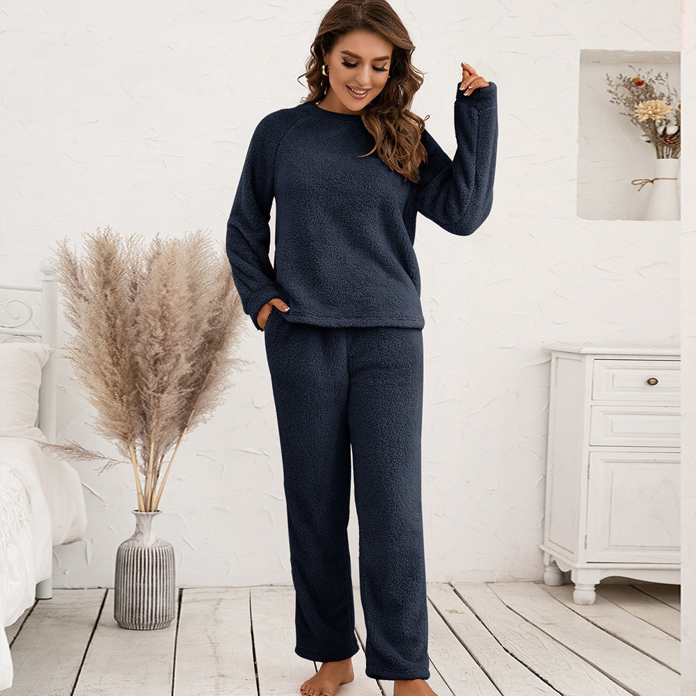 Stylish women's nightwear: a soft long sleeve top and relaxed fit pajama pants.