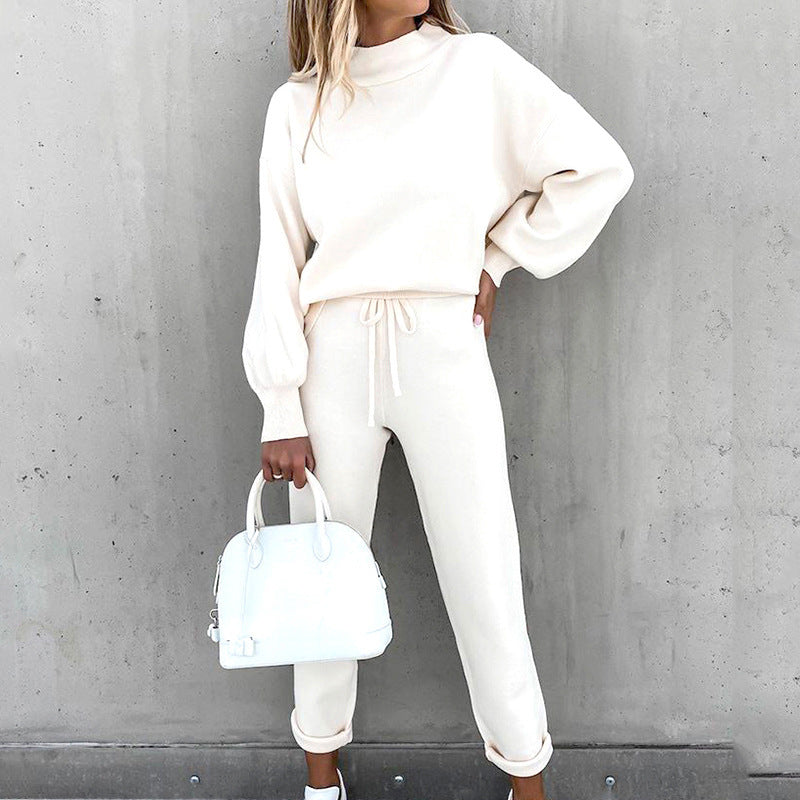 Women's cozy loungewear track suit with turtleneck top & high waist pants, perfect for relaxation & style.