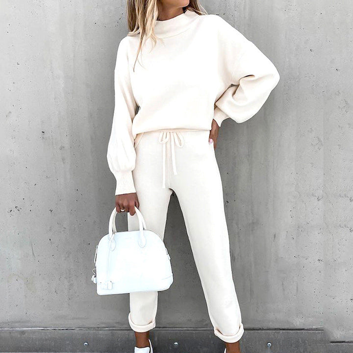 Women's cozy loungewear track suit with turtleneck top & high waist pants, perfect for relaxation & style.